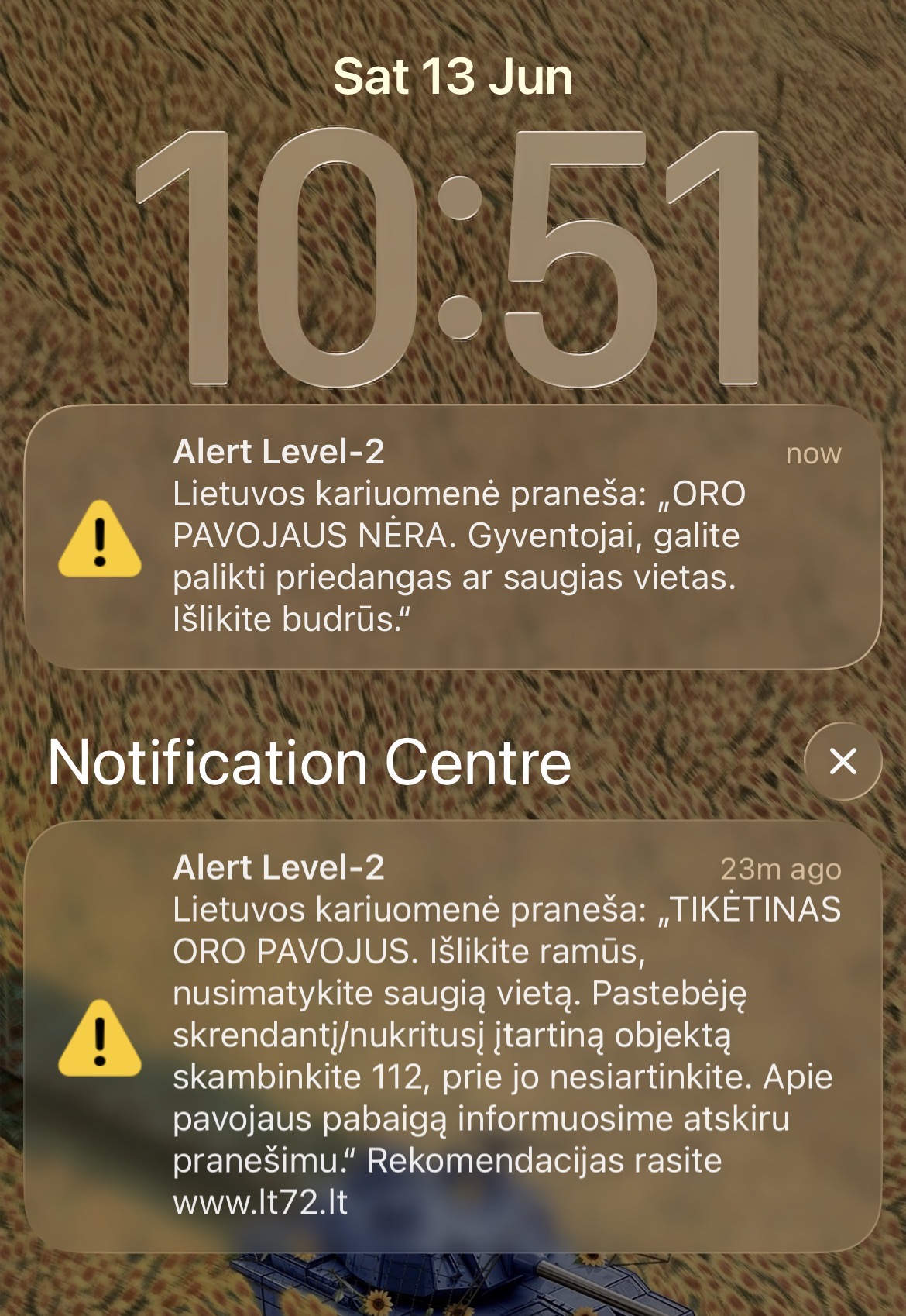 Lithuanian Armed Forces all-clear notification alongside the original yellow-level alert, 13 June 2026